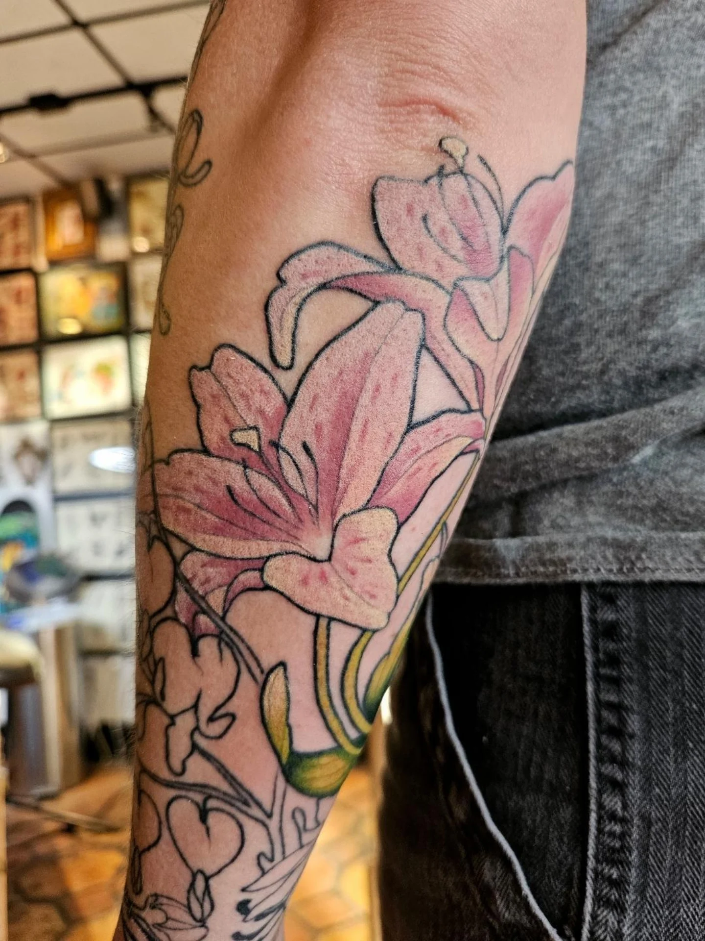 Lilies realism tattoo on the forearm by Ayla Stone, Salt Lake City, Utah
