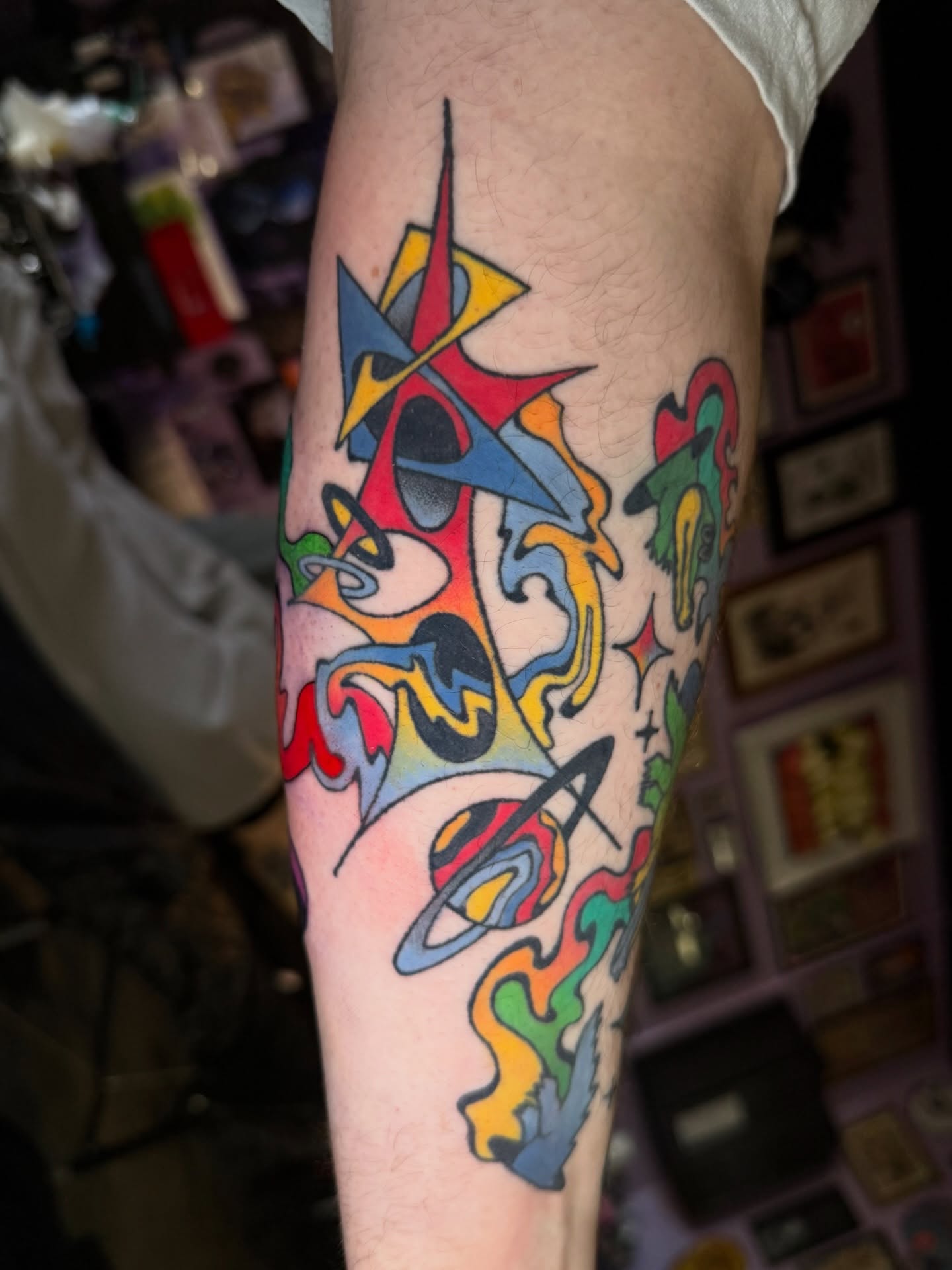 Astronomy-themed abstract new school tattoo on the forearm by 🍄Annie Burkhard🍄, Indianapolis, Indiana