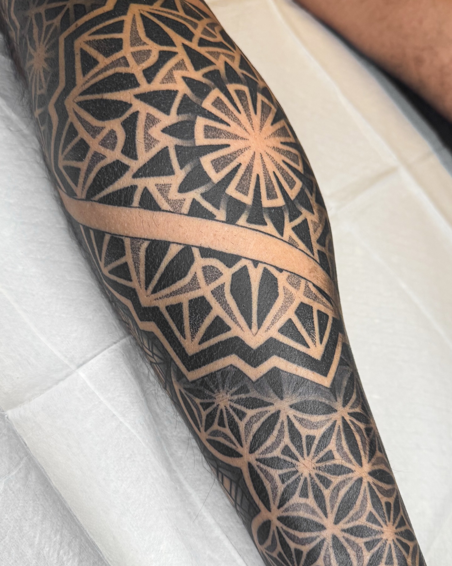 Tattoo by @rjxdots — geometric