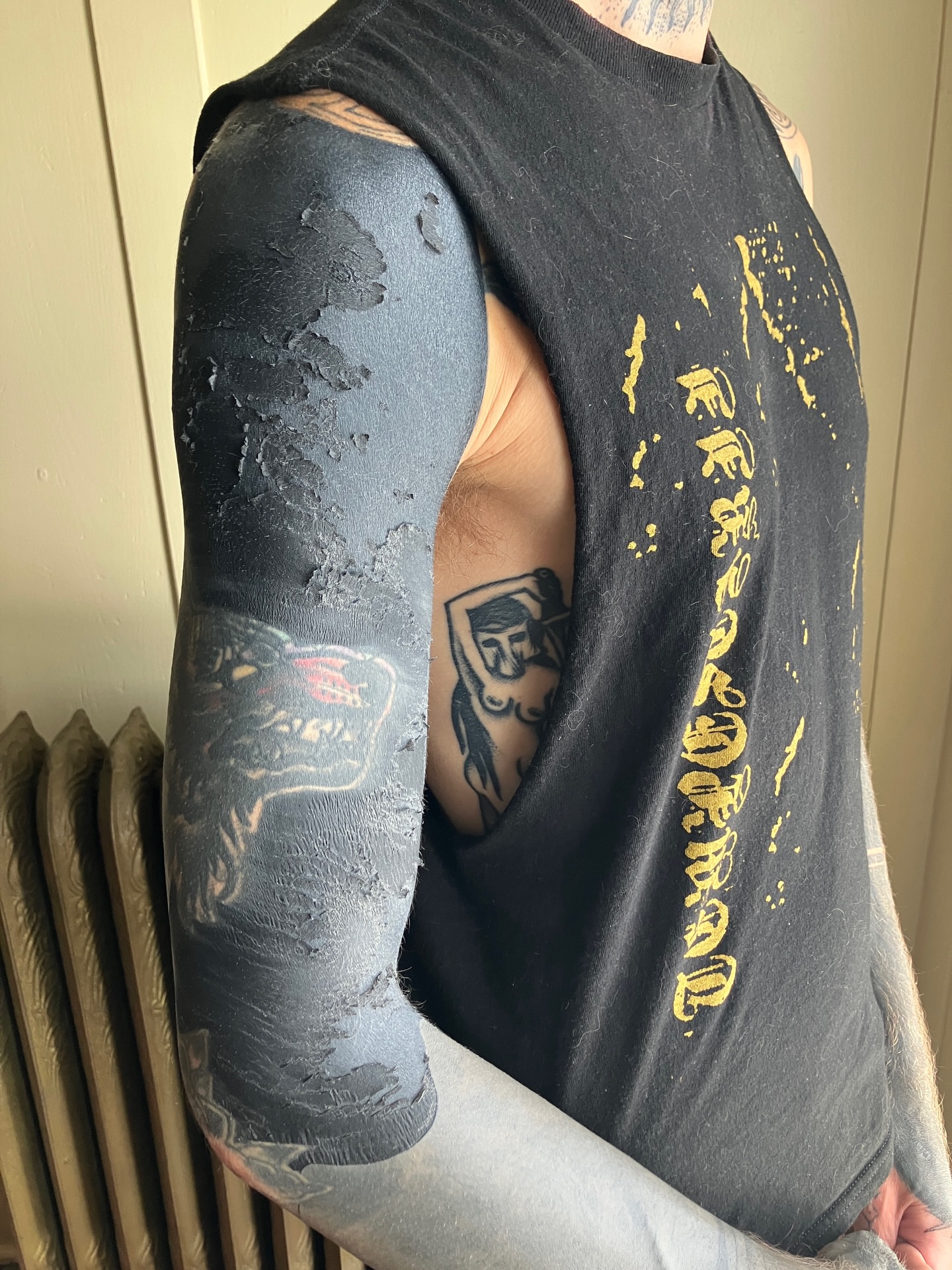 Wolf American traditional tattoo on the upper arm by S C A B B e R W O C K y