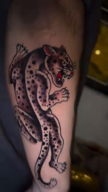Panther realism tattoo on the forearm by Olivia Marie