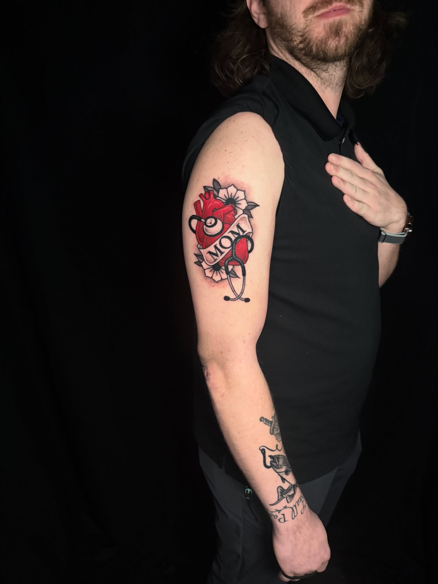 Stethoscope and rose American traditional tattoo on the forearm by z o y a, Seattle, Washington