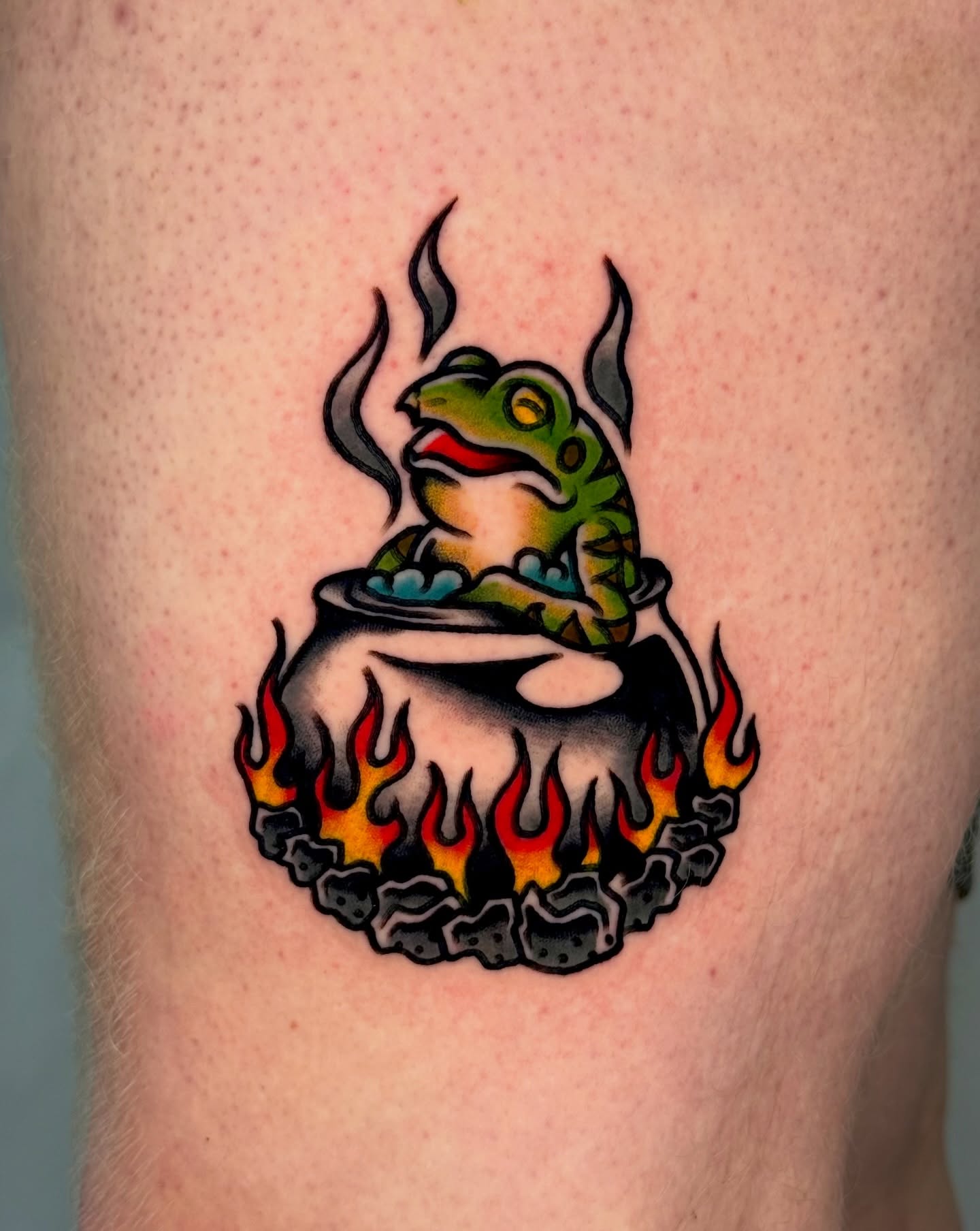Frog in cauldron American traditional tattoo on the thigh by Tattooer Sancho 🇰🇷🇨🇦