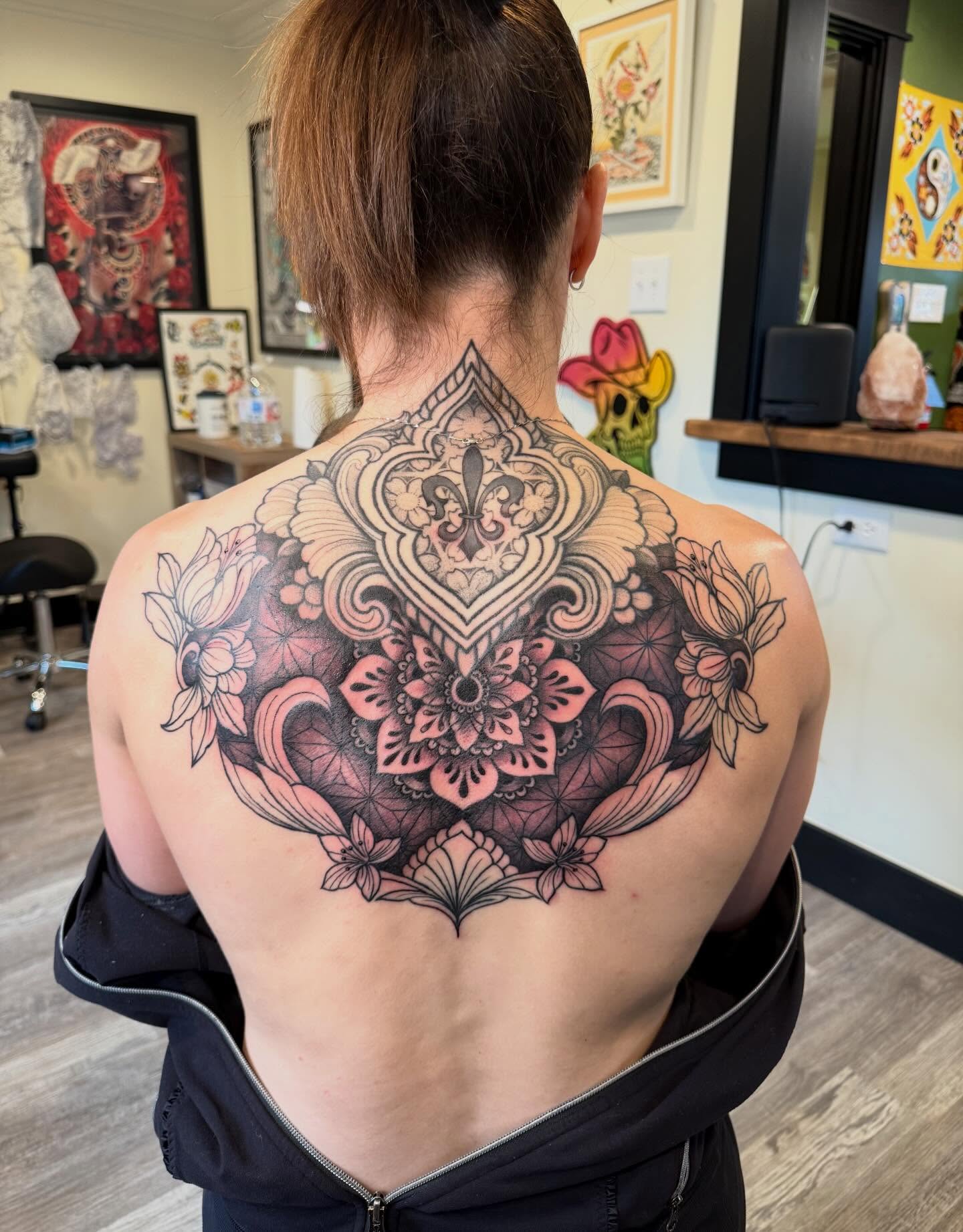 Floral mandala ornamental tattoo on the back by Rebecca Basma Smith