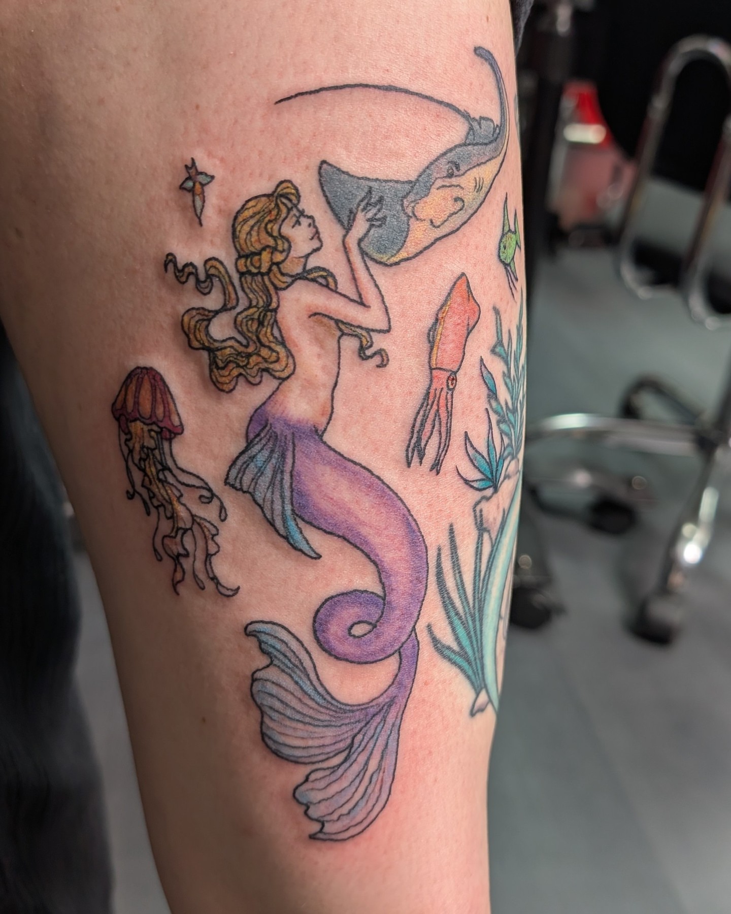 Mermaid new school tattoo on the leg by Trinity Renee