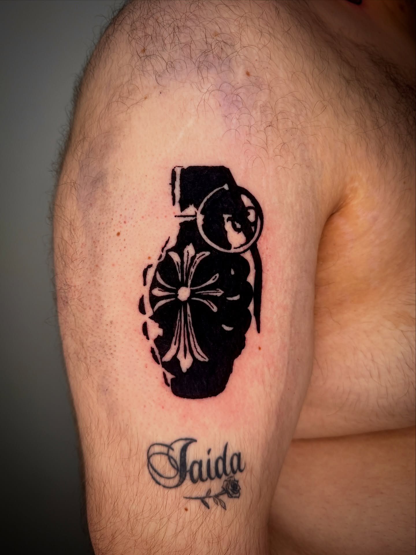 Grenade black and grey tattoo on the forearm by 𝔠𝔲𝔯𝔱𝔦𝔰 ~ tattoo artist
