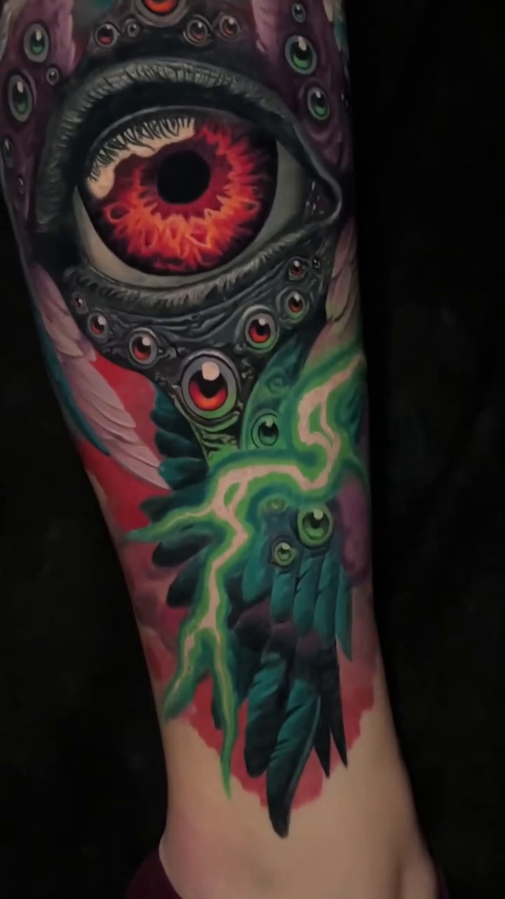 Eye and wings realism tattoo by Sean Foy