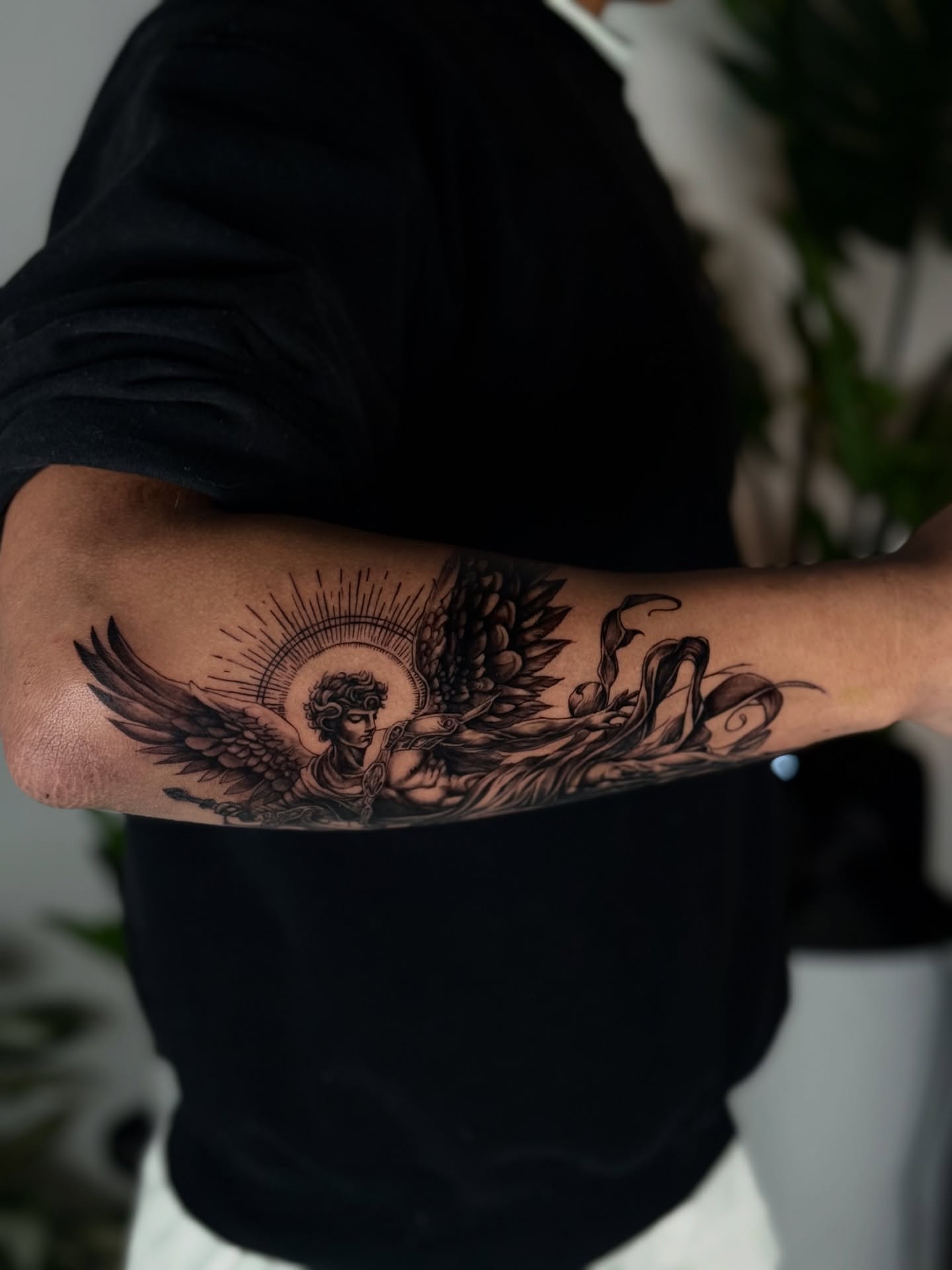 Angel with wings black and grey tattoo on the forearm by ♍️𝒾𝒸𝒽𝑒𝓁𝓁𝑒⁺‧₊˚ ཐི⋆♱⋆ཋྀ ˚₊‧⁺, Charlotte, North Carolina