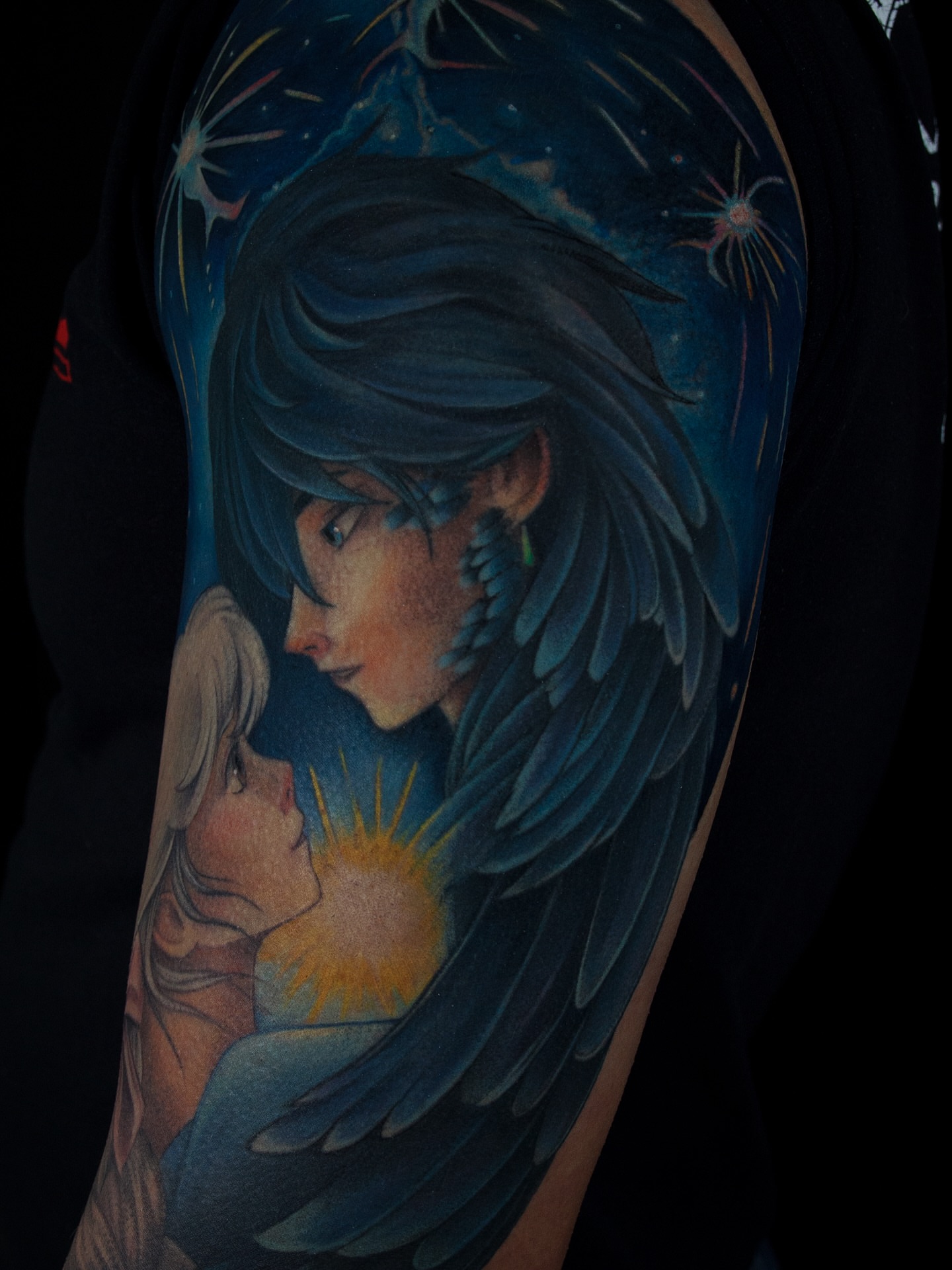 Angel and child realism tattoo on the forearm by caliope yiannos