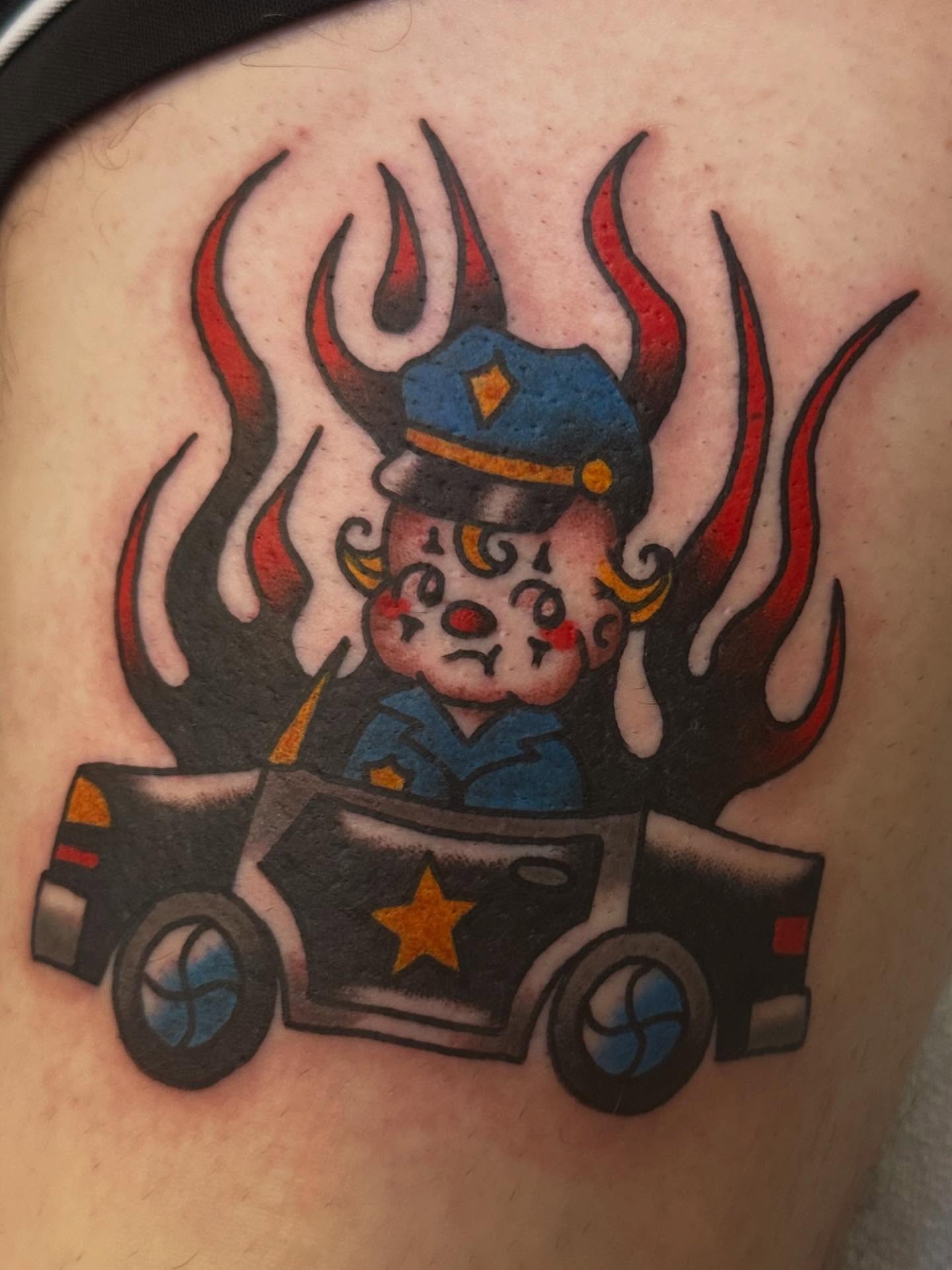 Clown police officer driving car American traditional tattoo on the thigh by ࿊ Emma Sloan Tattoos ࿊, Austin, Texas