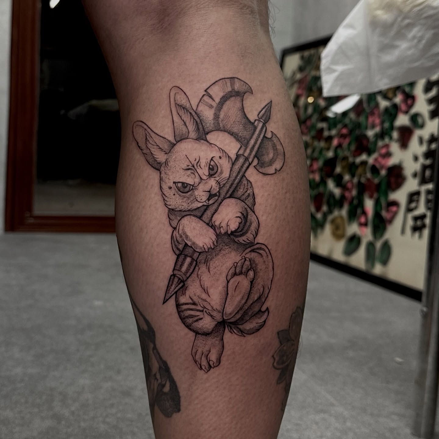 Cat warrior realism tattoo on the thigh by Arhem Quiambao