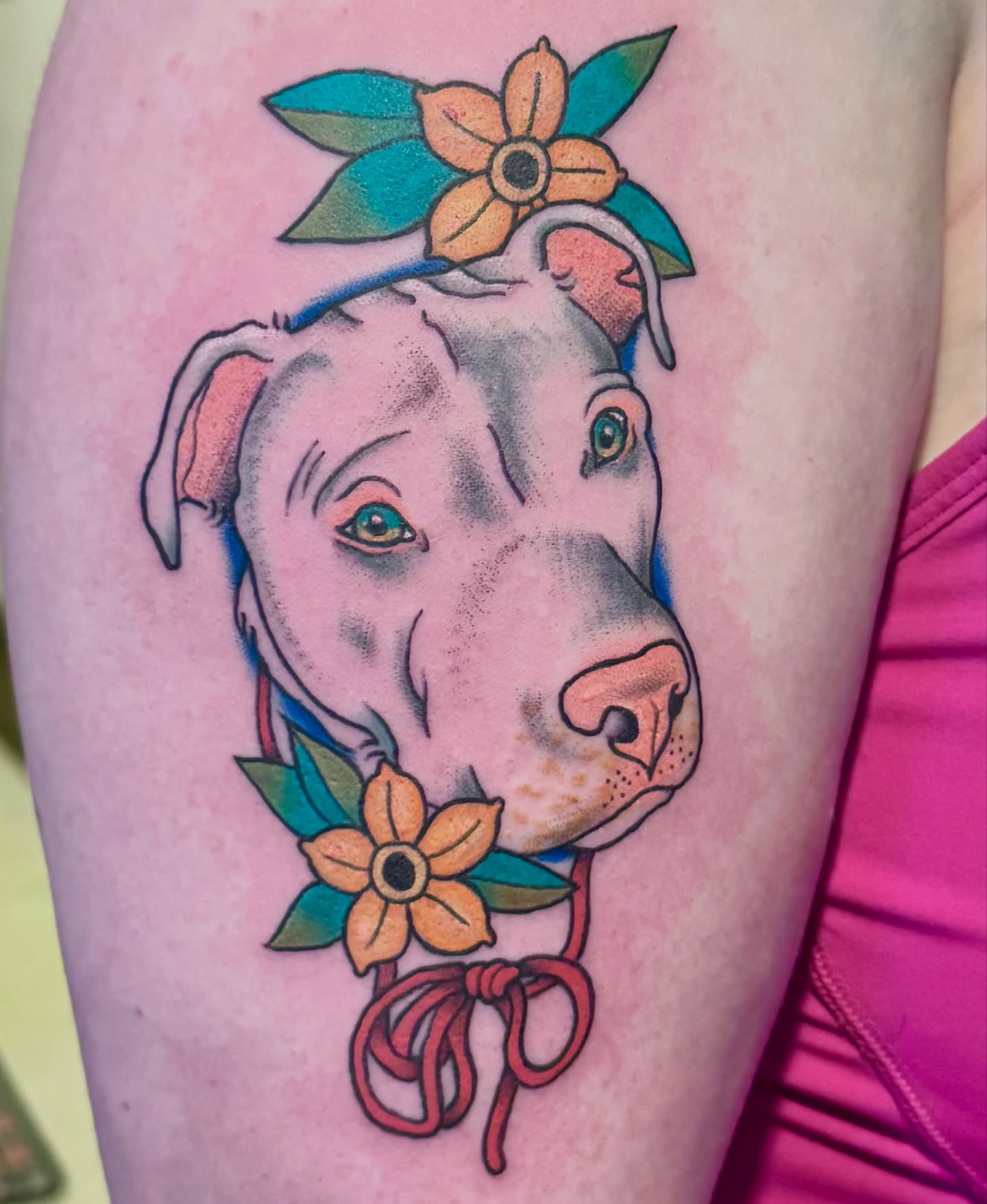 Pit bull with flowers realism tattoo on the forearm by Bronzino Ink - Karen, Asheville, North Carolina