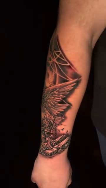 Angelic figure with wings dark realism tattoo by Sergio Ramirez