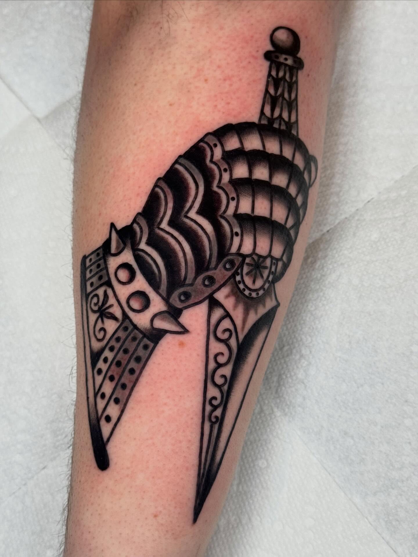 Sword black and grey tattoo on the forearm by JoJo Benton