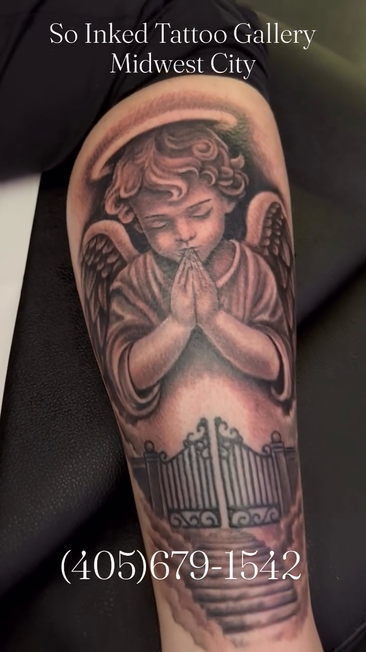 Angel with gates realism tattoo by Germaine Sherman