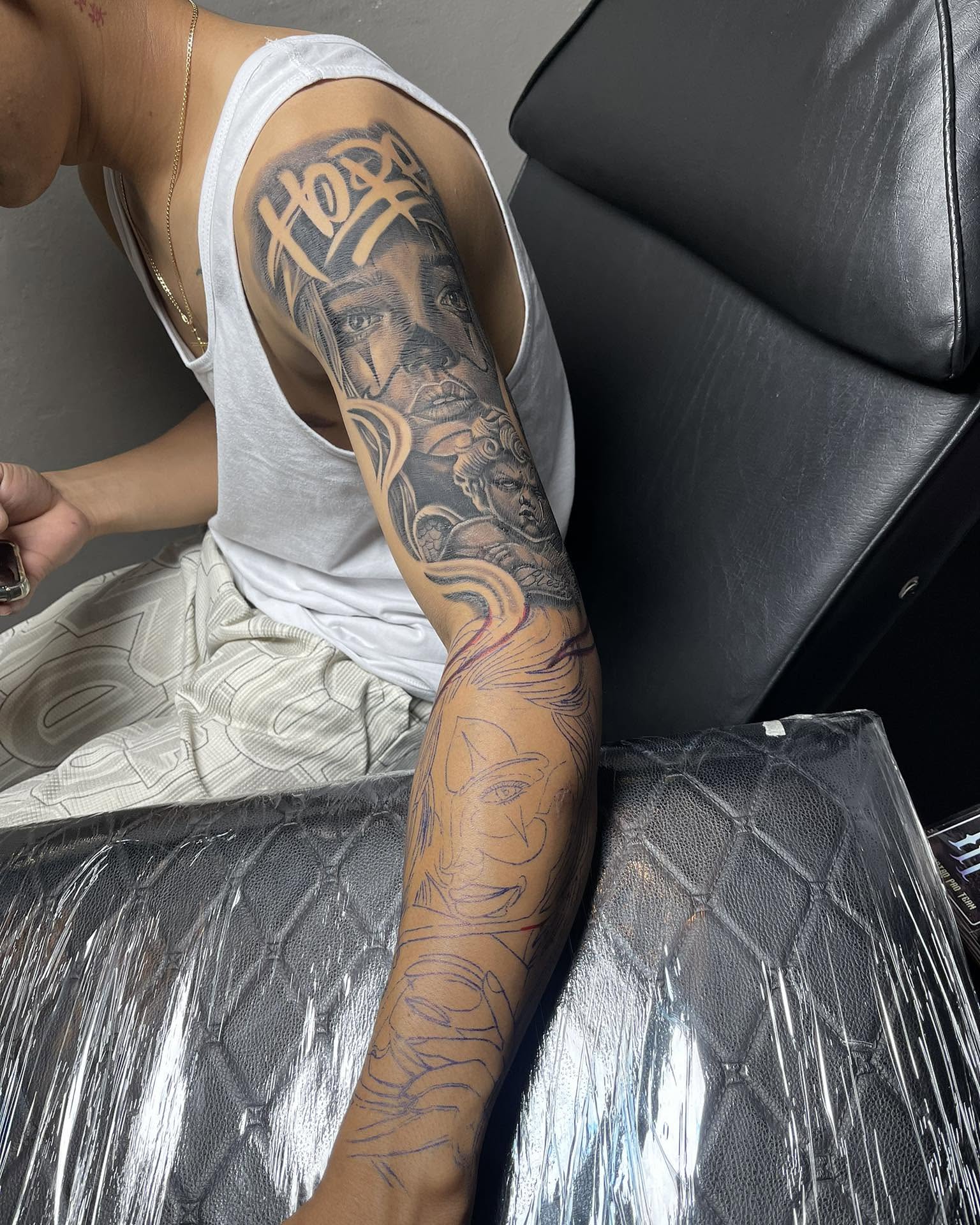 Tattoo by @saintstatts — realism, black_and_grey