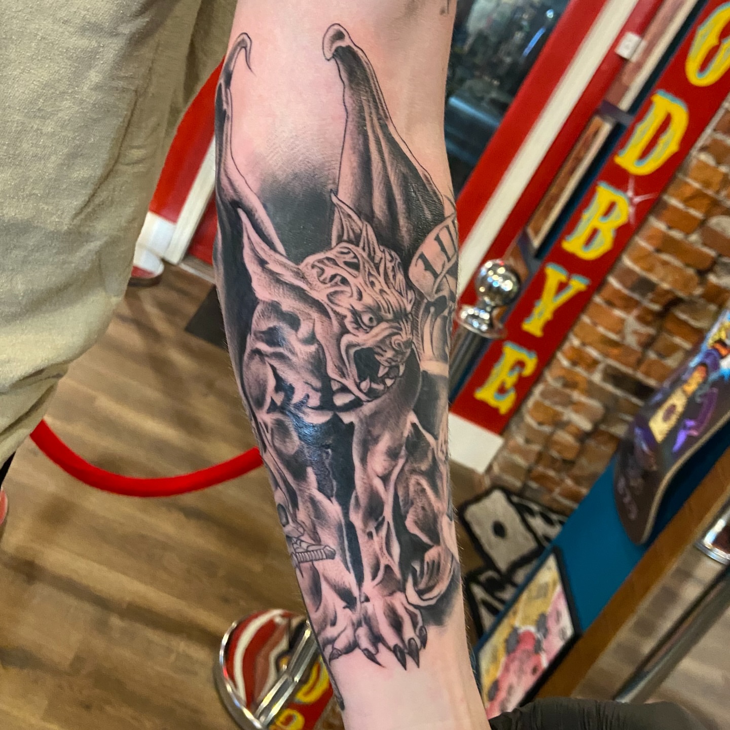Demon realism tattoo on the forearm by Anthony Robles