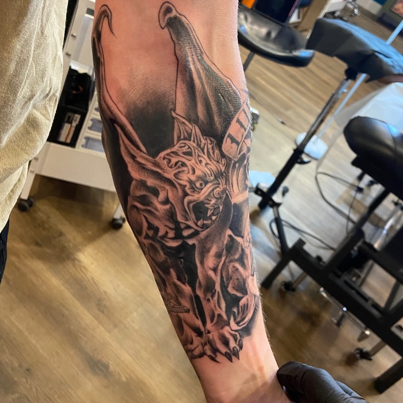 Lion realism tattoo on the forearm by Anthony Robles