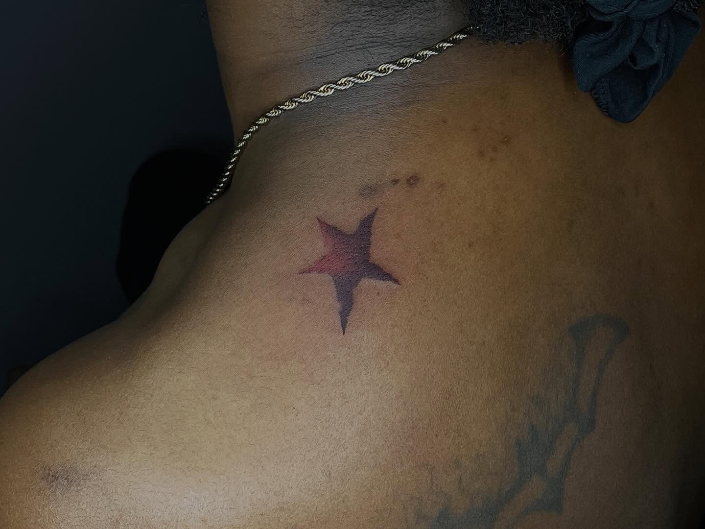 Star American traditional tattoo on the back by Thiên Hồ