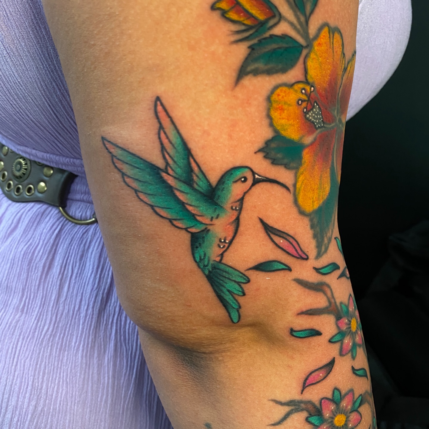 Hummingbird and flowers American traditional tattoo on the forearm by Marcos🇩🇴