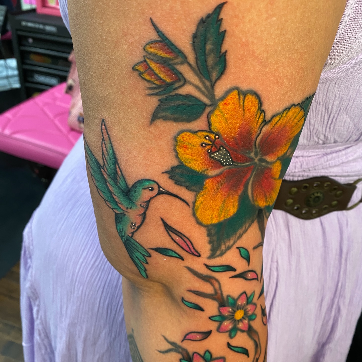 Hummingbird and flower American traditional tattoo on the forearm by Marcos🇩🇴