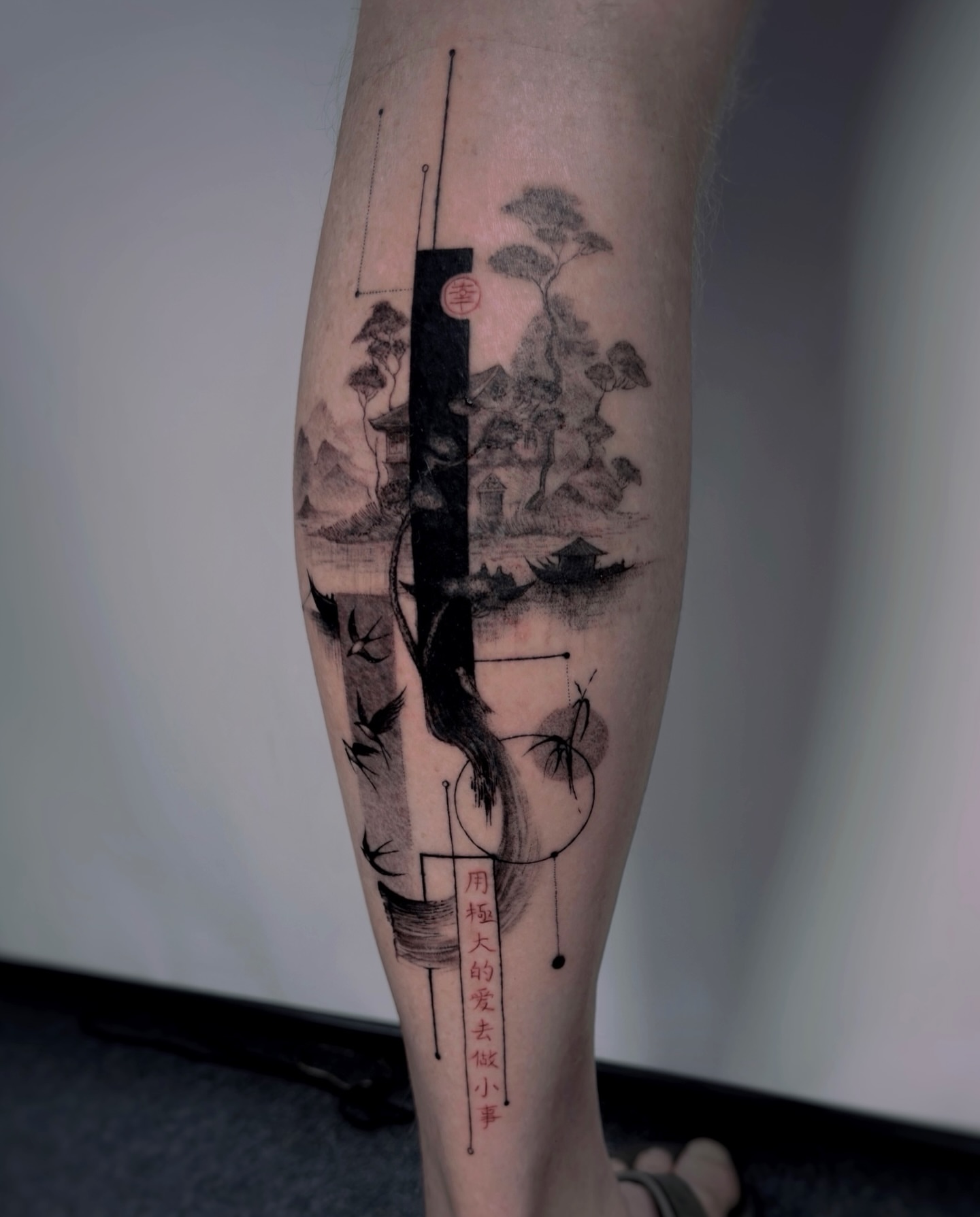 Landscape realism tattoo on the calf by Lily K.