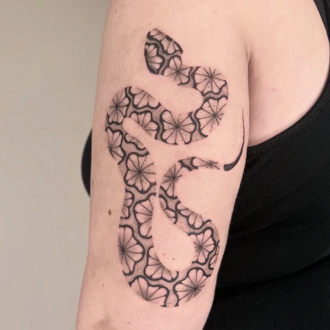 Tattoo by @leahramosink — geometric, dotwork