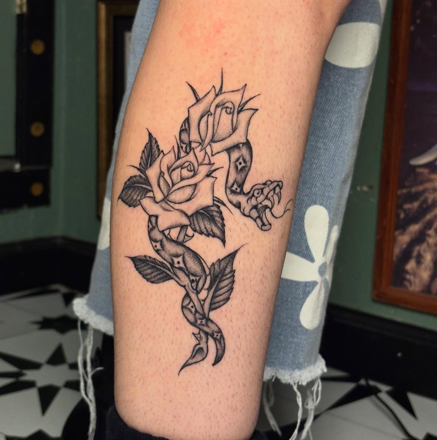 Roses and snake black and grey tattoo on the forearm by ☻︎ Cyd Precious ☹︎