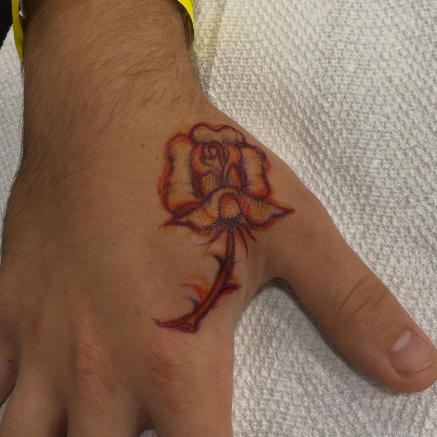 Rose watercolor tattoo on the hand by @nickysix86