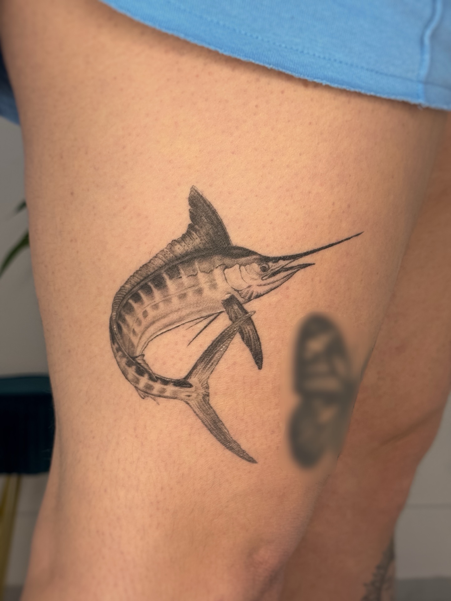 Swordfish realism tattoo on the thigh by Gianna Rodriguez