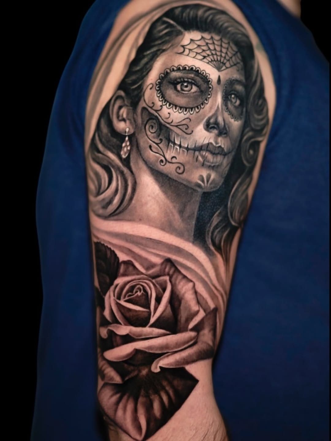 Sugar skull woman and rose realism tattoo on the forearm by David Gordon