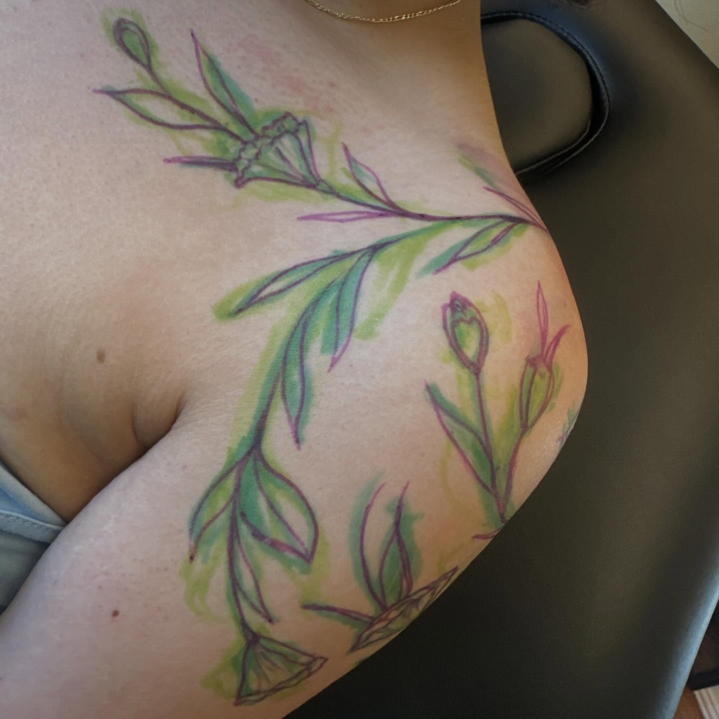 Floral design watercolor tattoo on the thigh by Raul Najera Tattoo, Plano, Texas