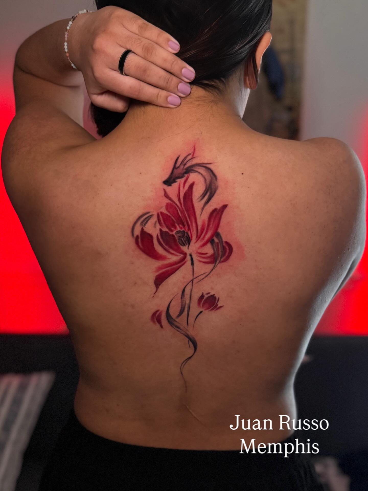Lotus and dragon new school tattoo on the back by Juan Russo