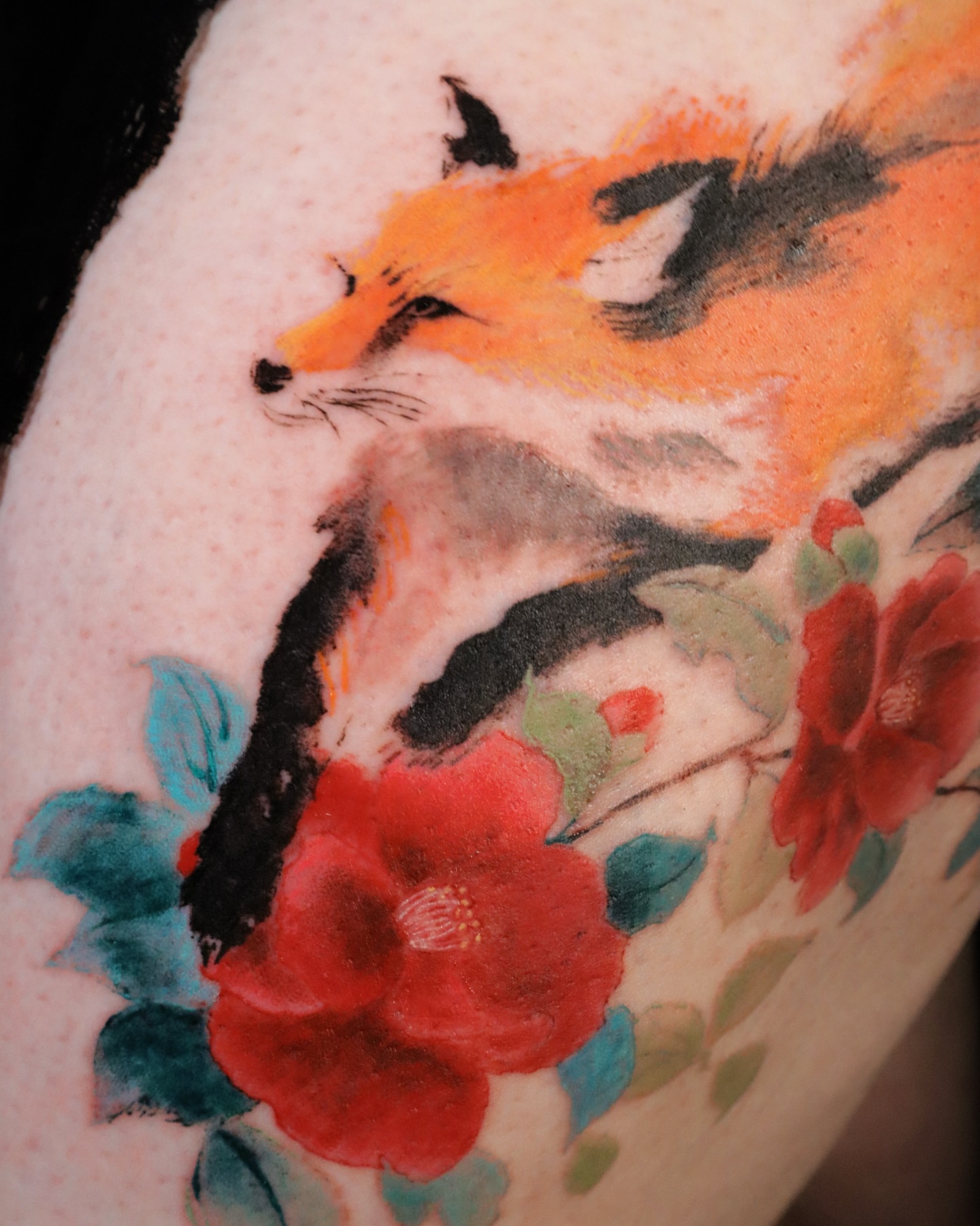 Fox and flowers watercolor tattoo on the upper arm by Sylvia｜思岐, Vancouver, British Columbia