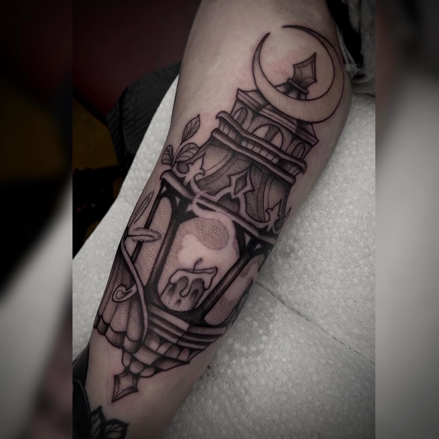 Hourglass with skull black and grey tattoo on the forearm by Alyssa Deeghan