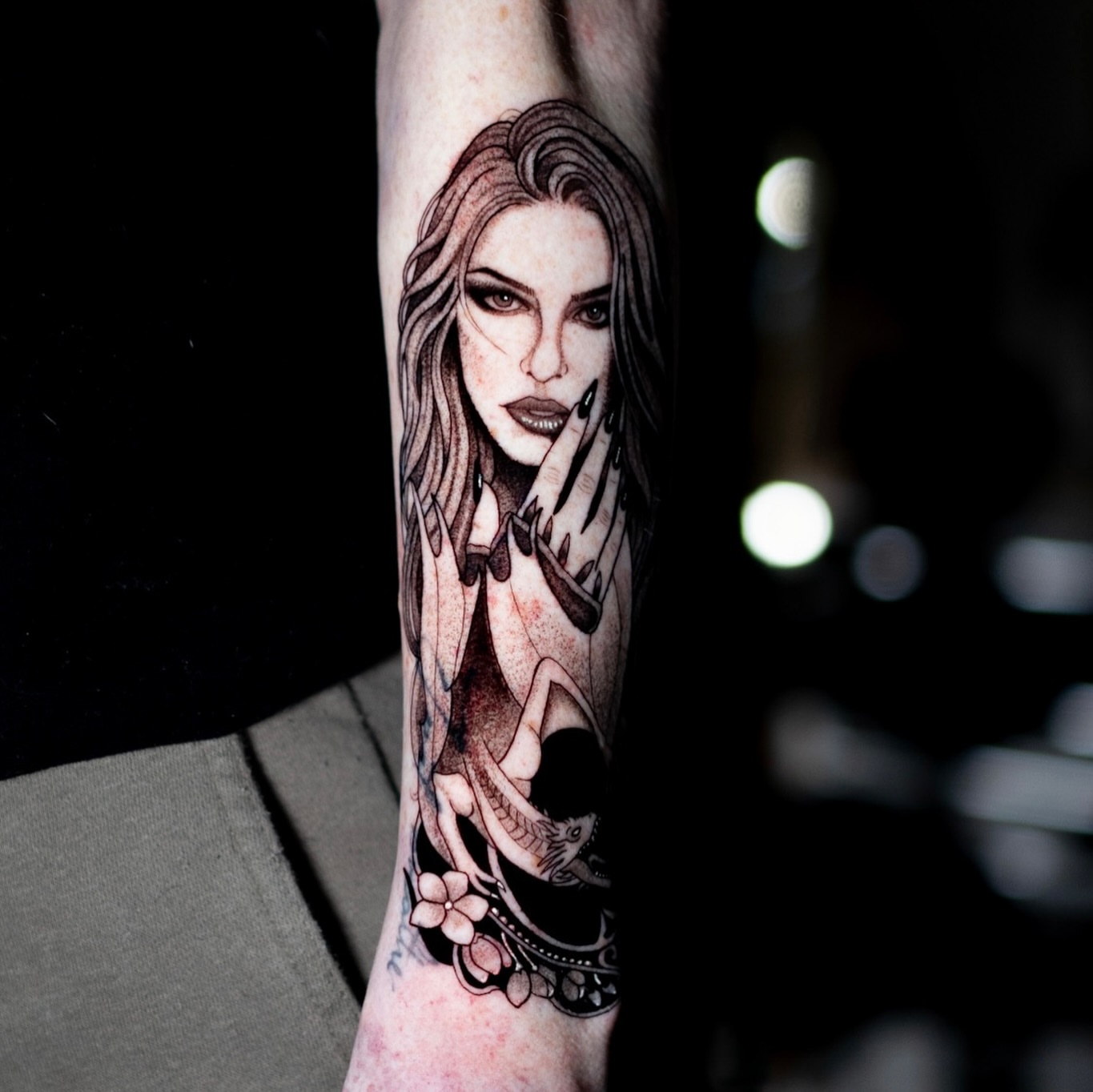 Woman with long hair realism tattoo on the forearm by Jorden Ruppe