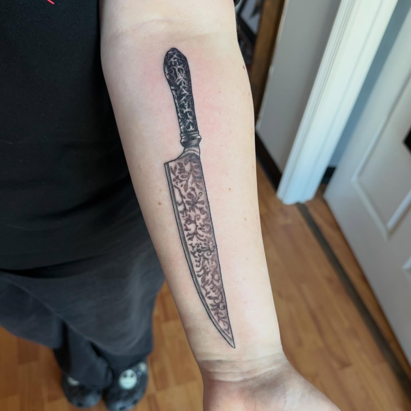 Knife realism tattoo on the forearm by Matt Hattaway