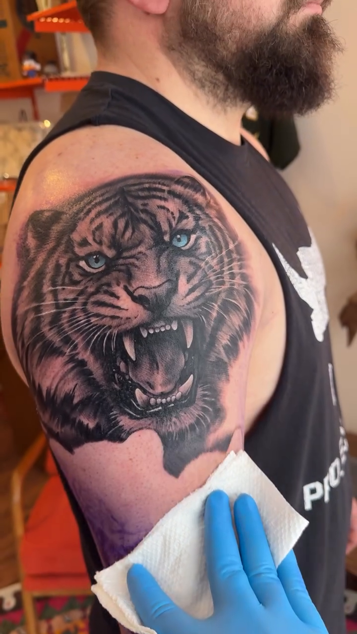 Tattoo by @brycemoodietattoo — realism, black_and_grey