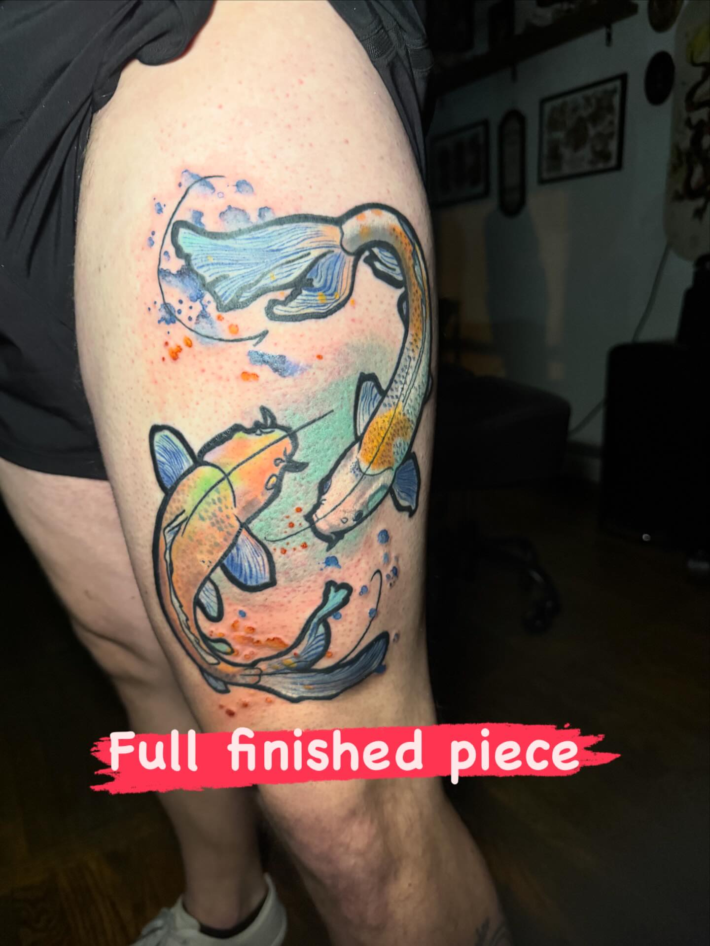 Koi fish watercolor tattoo on the upper arm by Paula.p.tattoos