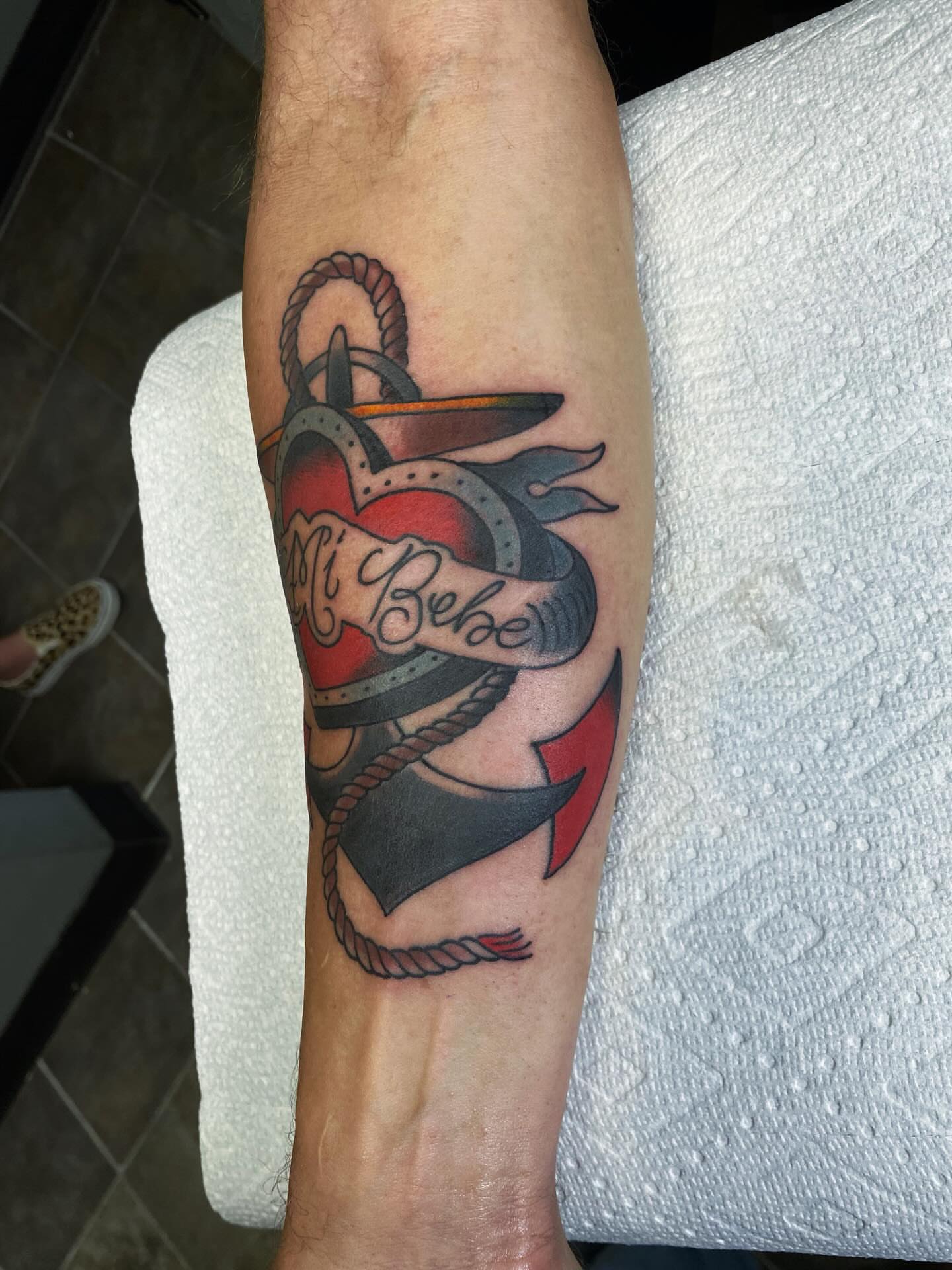 Anchor with heart American traditional tattoo on the forearm by Houston tattoo artist