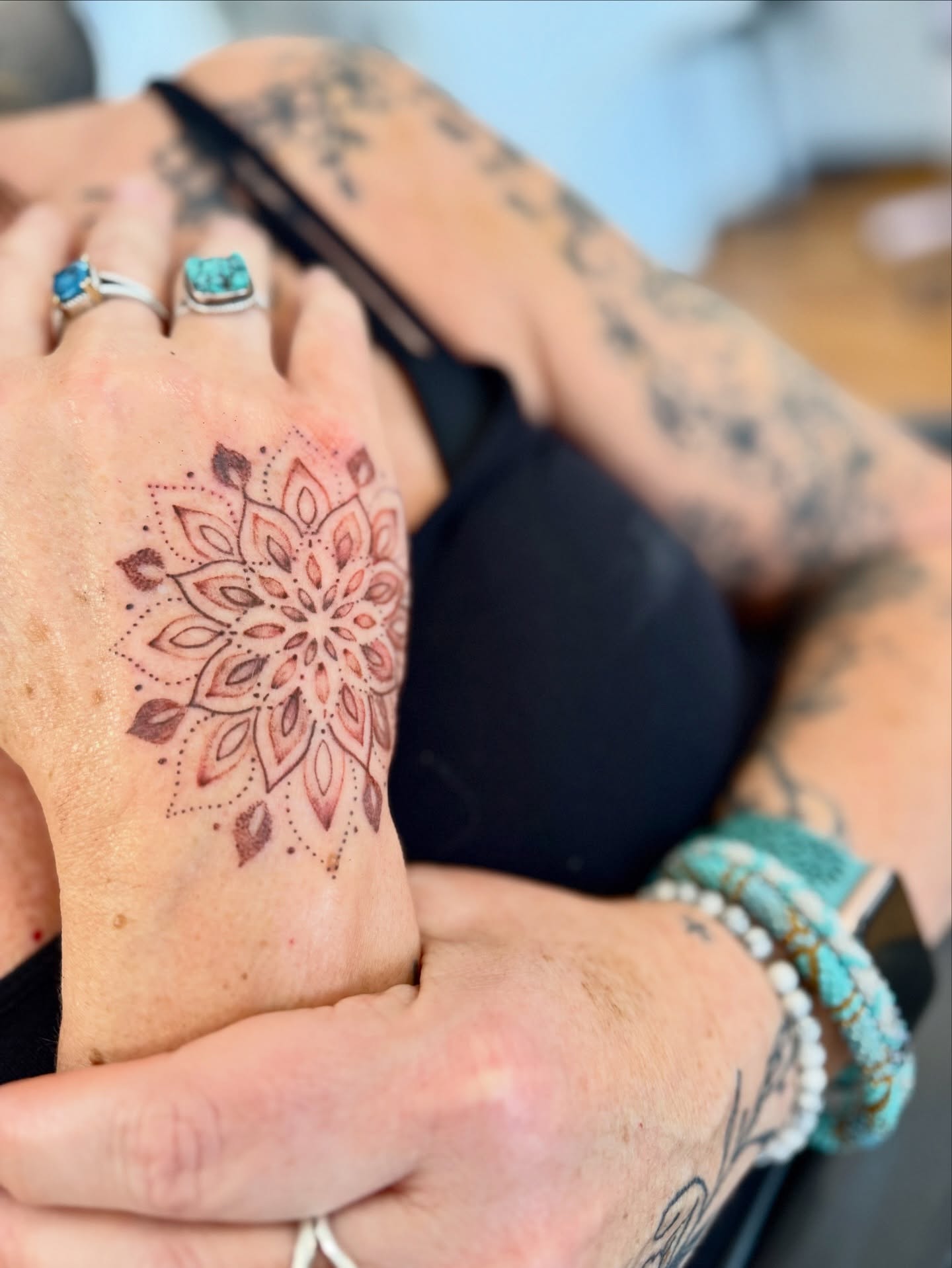 Mandala dotwork tattoo on the hand by Lindsay Shriver