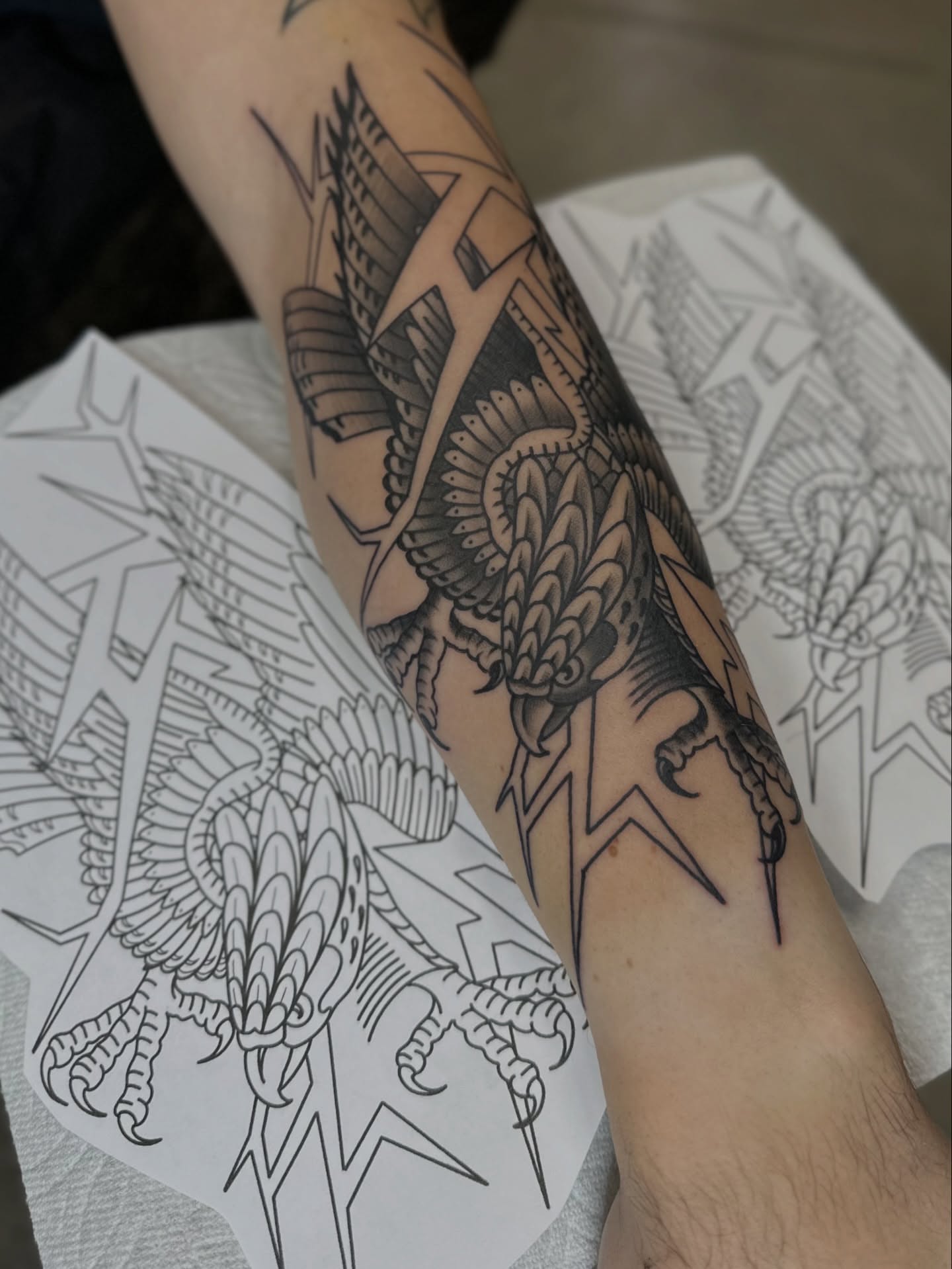 Phoenix American traditional tattoo on the forearm by Walk-in American Traditional Tattoos Las