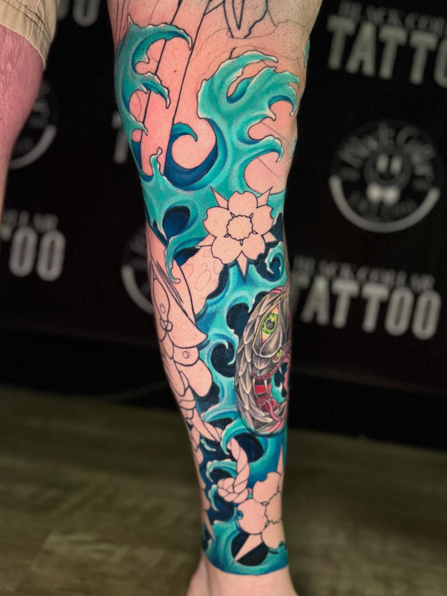 Dragon and floral japanese irezumi tattoo on the forearm by InkFloyd Roith