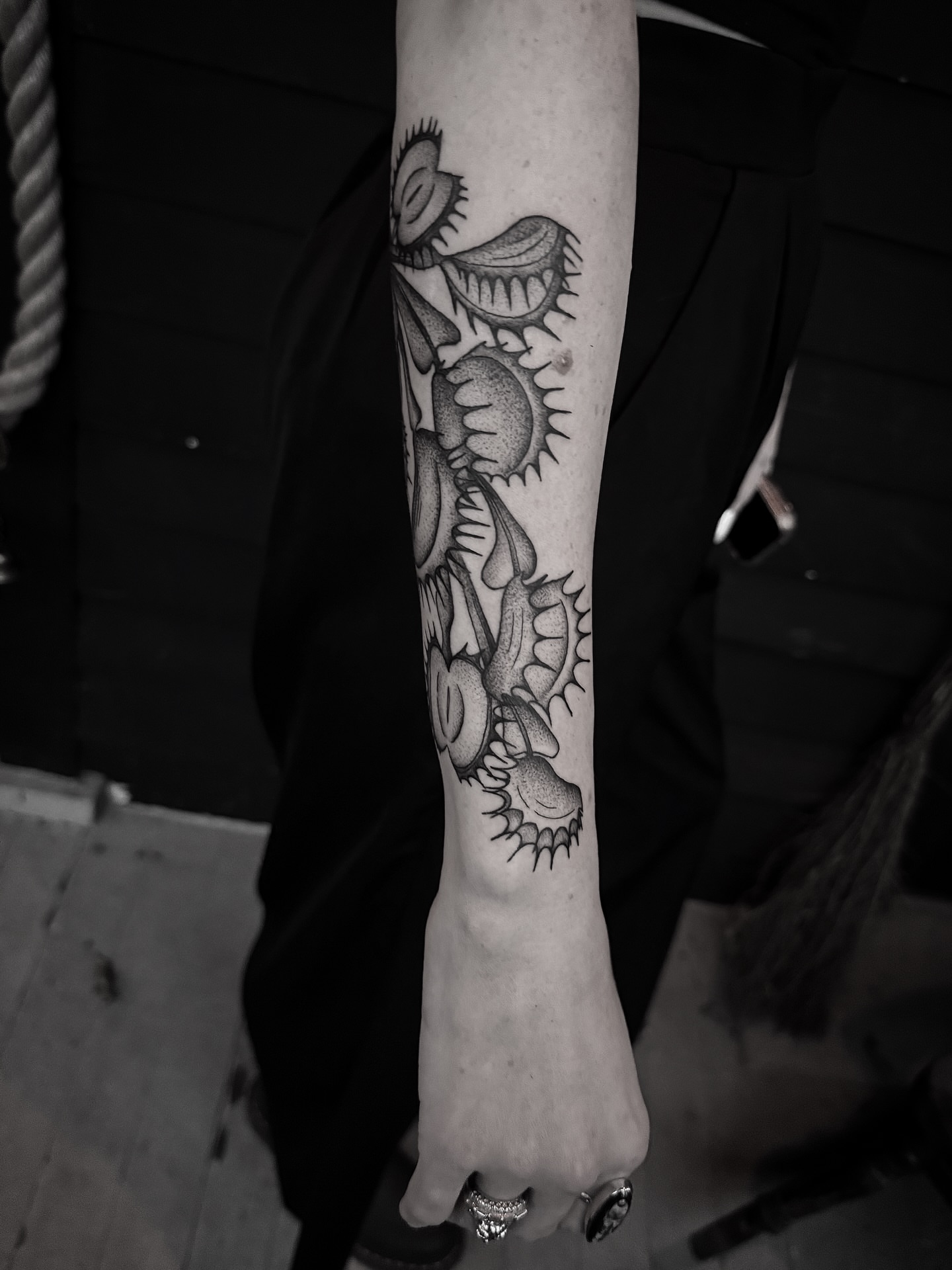 Monster dotwork tattoo on the forearm by Breezy Tucker