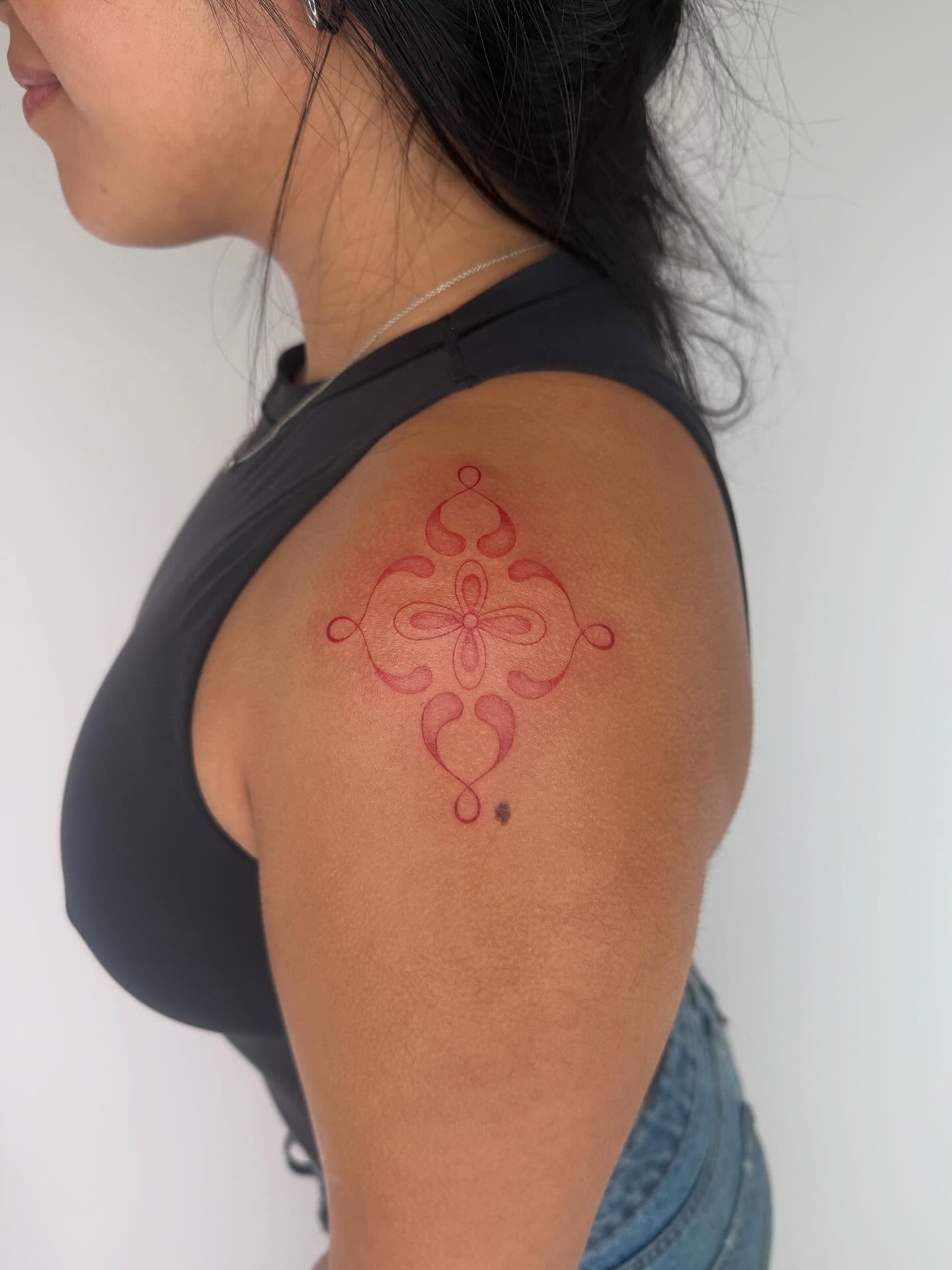 Geometric pattern geometric tattoo on the shoulder by Leah Ramos