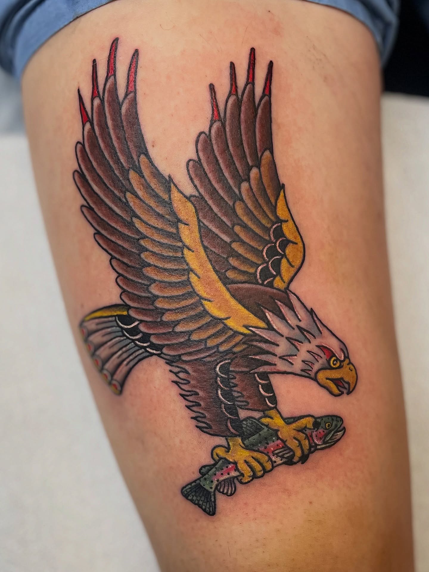 Eagle with fish American traditional tattoo on the thigh by πΌπ
ππΎπππππ
