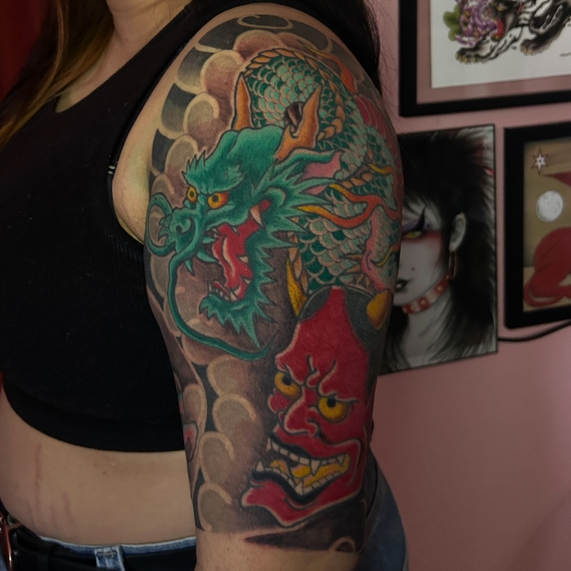 Dragon and mask japanese irezumi tattoo on the upper arm by Kat McCoy Guidera, Nashville, Tennessee