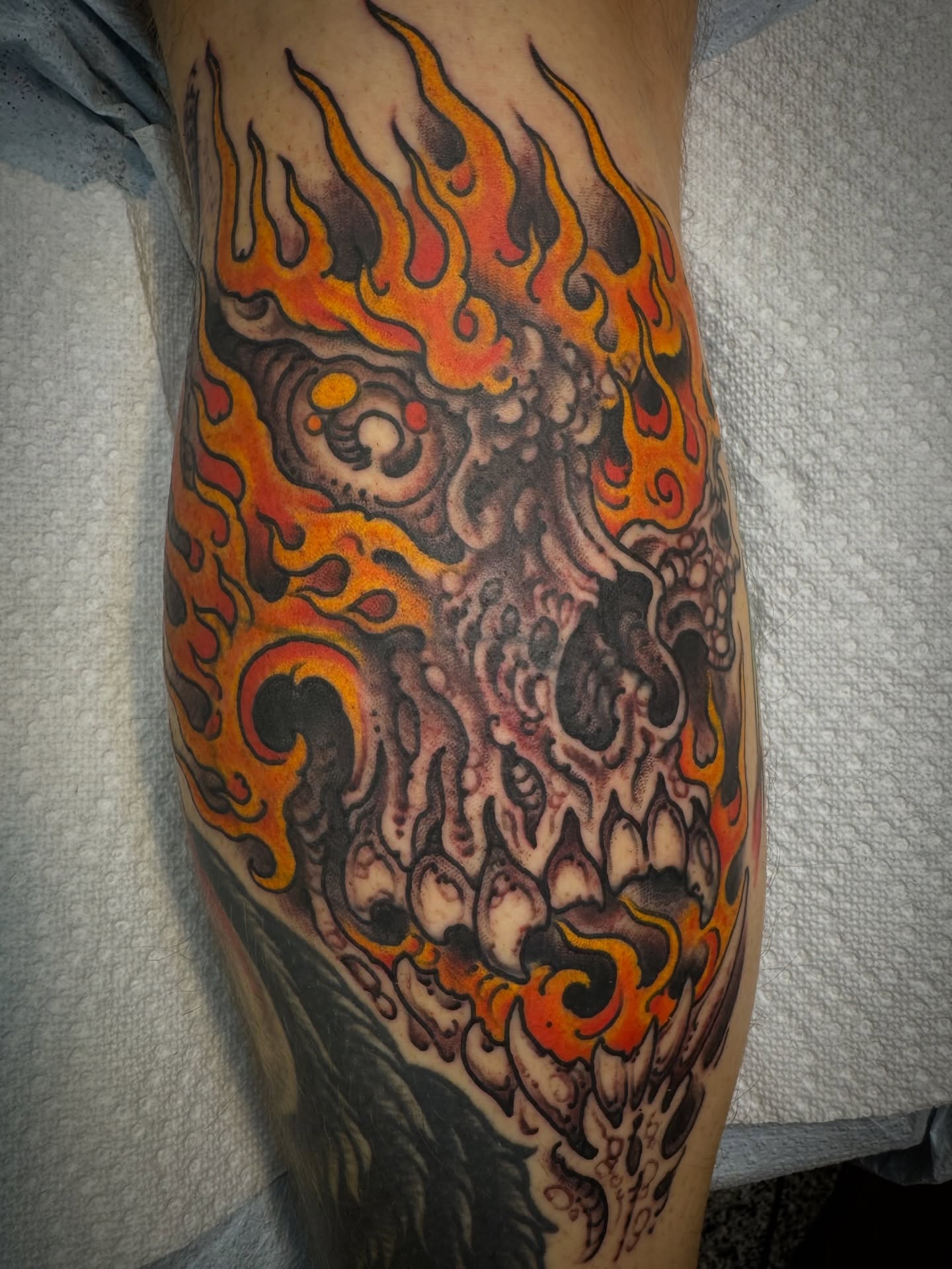 Flaming skull japanese irezumi tattoo on the forearm by J Ranno, Richmond, Virginia