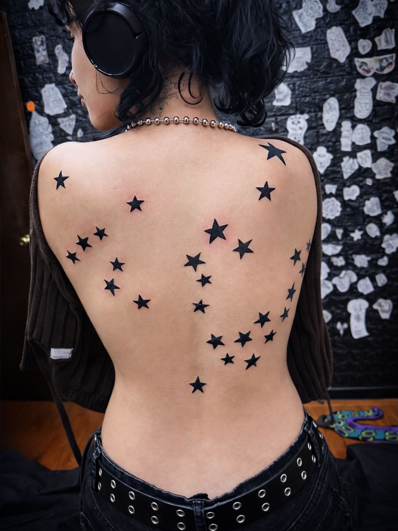 Stars black and grey tattoo on the back by Kraken ink Tattoo, San Francisco, California