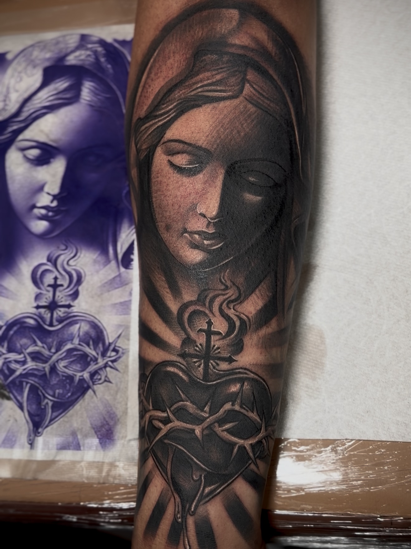 Sacred Heart realism tattoo on the forearm by Raul Rodriguez